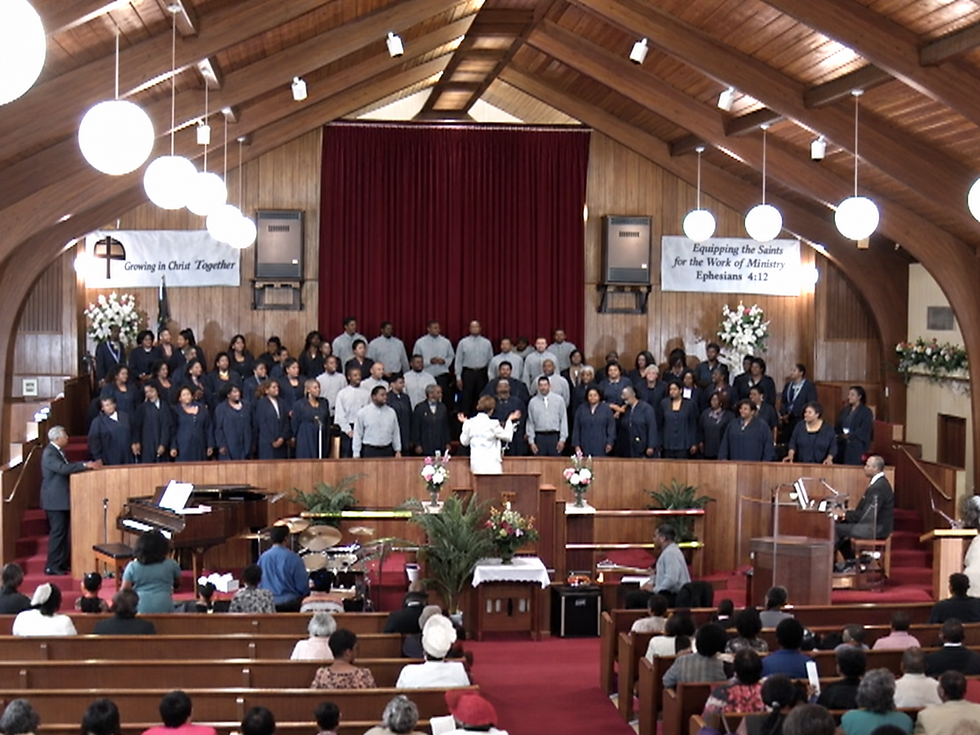 Little Zion congregation and choir worshiping in the sanctuary
