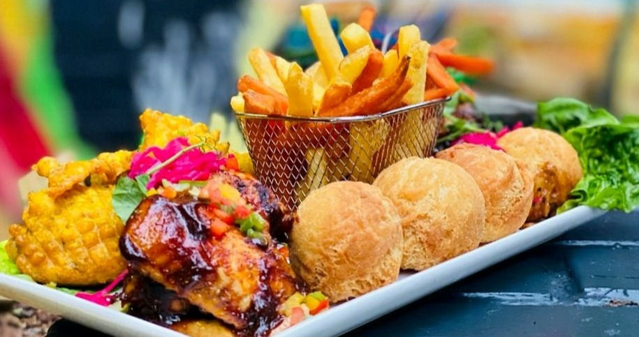 Eye-level view of a table set with colourful brunch dishes and drinks