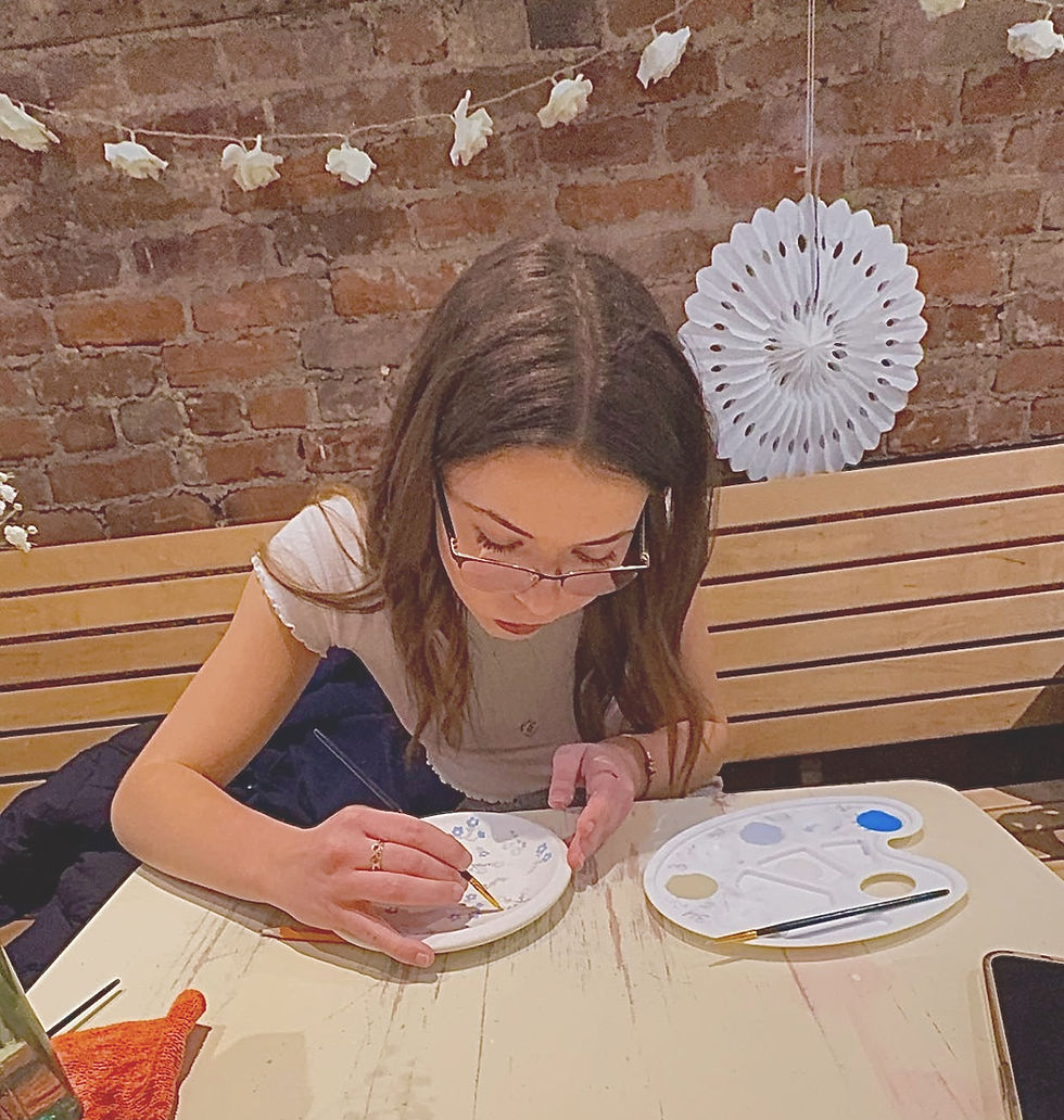 I prefer Sensing (S): A photo of me painting pottery—showing my appreciation for real-world, hands-on activities