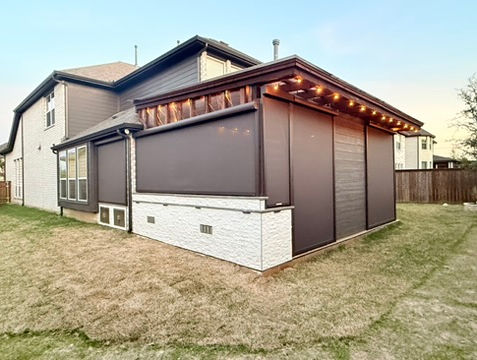 DFW patio shades on a house with string lights