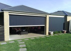 Outdoor patio featuring automatic shades in DFW