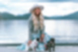 blue smiling single women with dogs.jpg