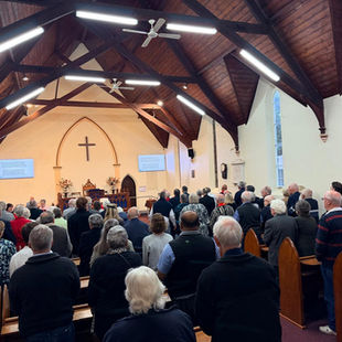 One Service,                                        Two Communities, A Warm Beginning