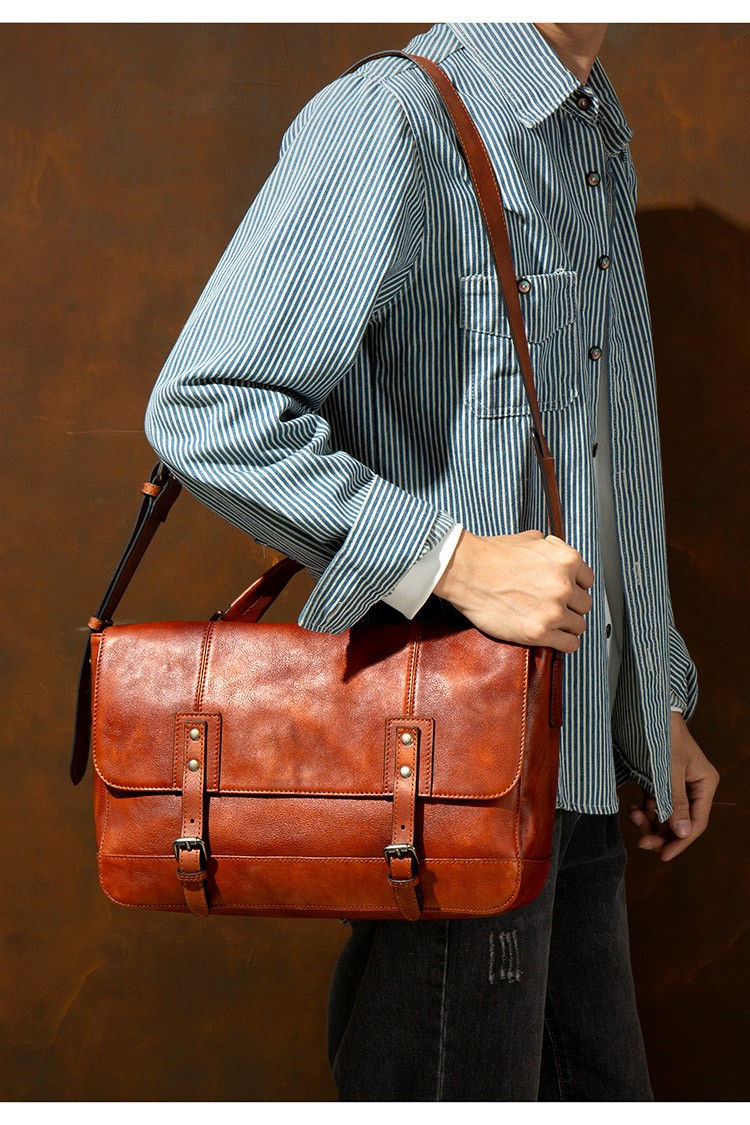 Thumbnail: Brown Heritage Leather Crossbody Bag – Premium Edition worn by the model over the shoulder.