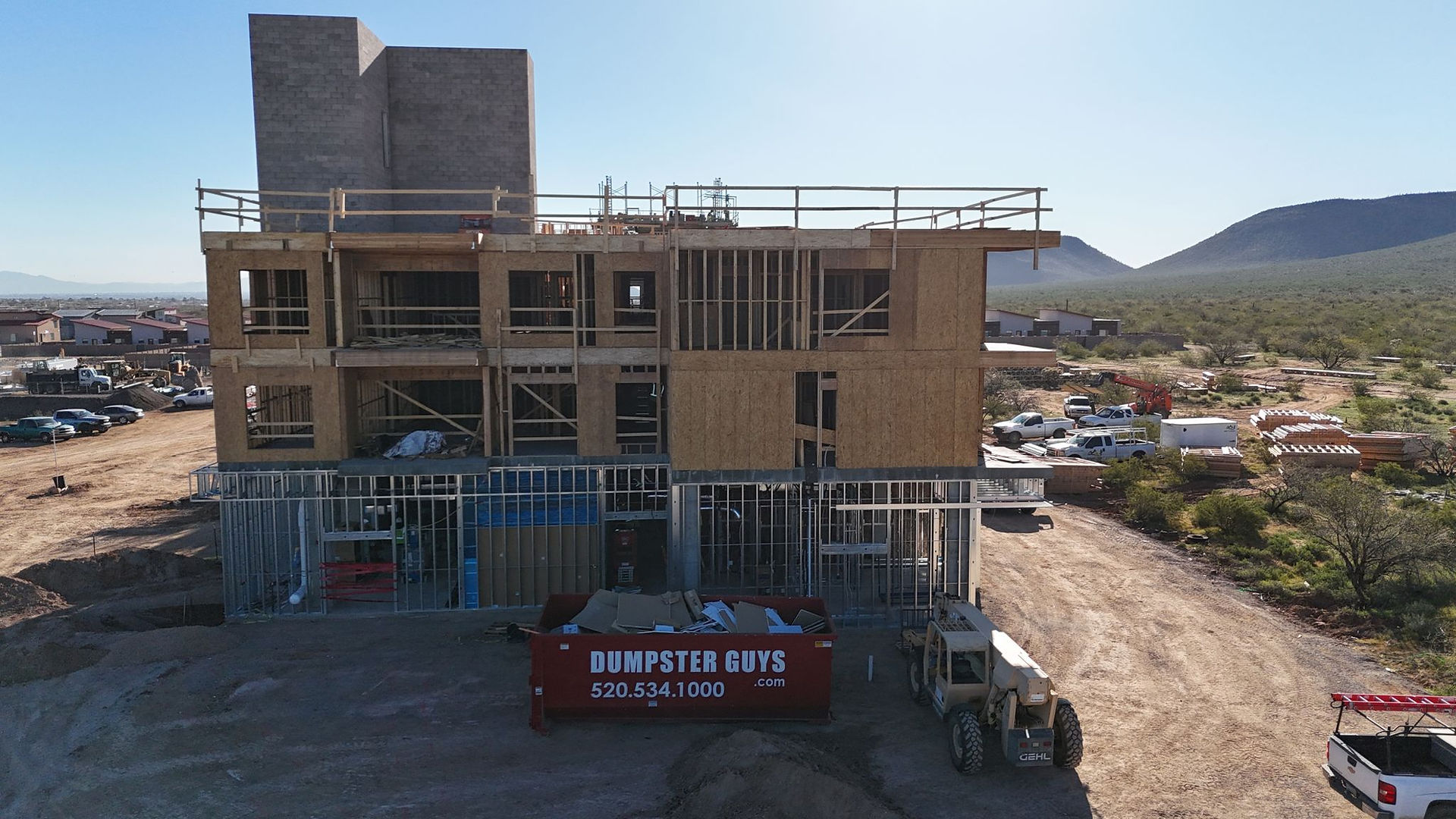 Side view of construction progress of apartment building