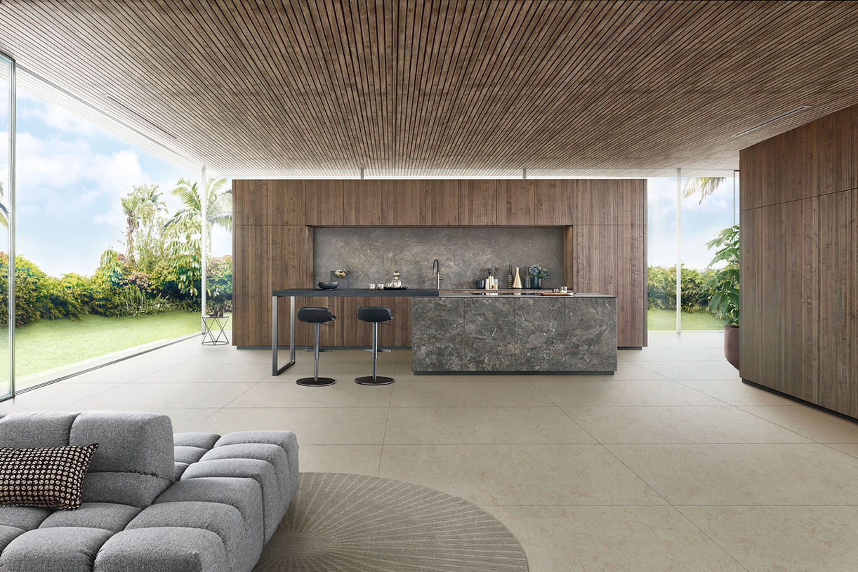 Airy modern walnut kitchen with natural light and earthy tones.