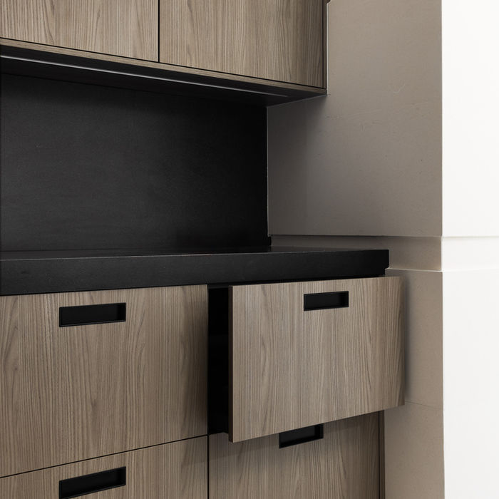 Functional modern grey kitchen blending contemporary design with innovation.