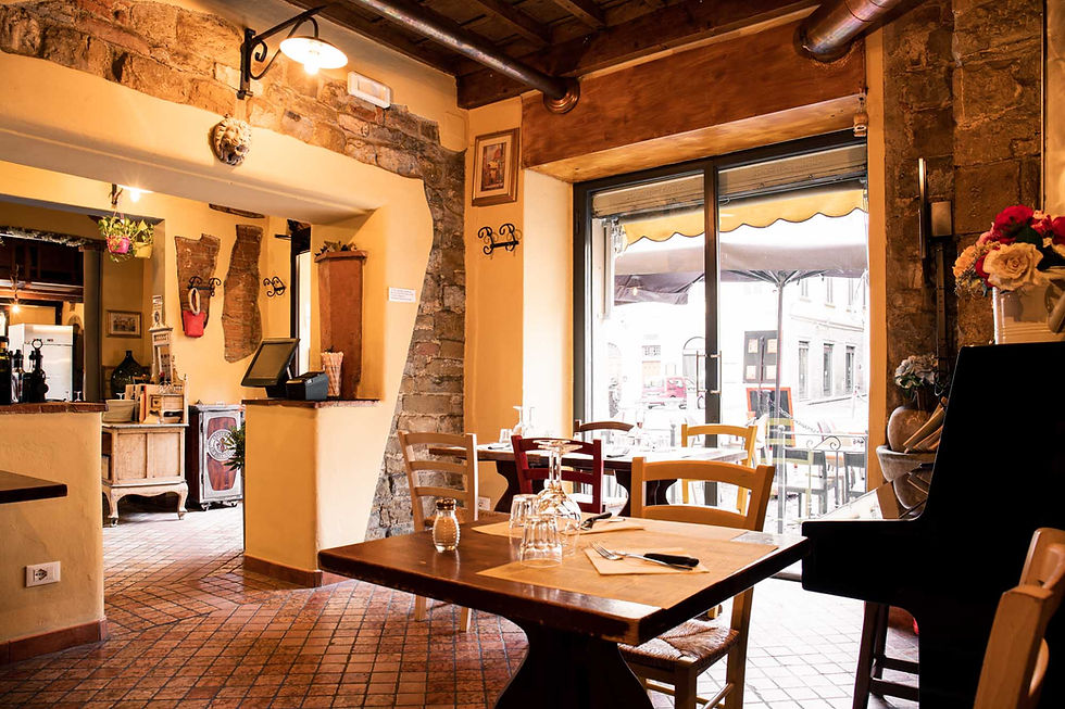 Osteria de' Peccatori Firenze interno sala tavoli apparecchiati