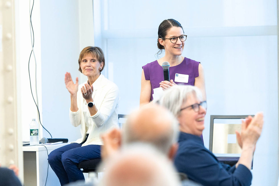 Speaker at a CCT wrap-up celebration