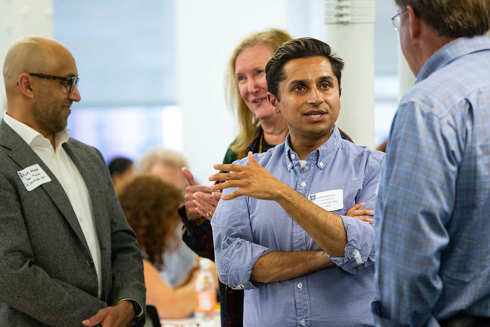 CCT volunteers mingling at a CCT event