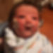 Baby Kyzer wrapped up in a swaddle