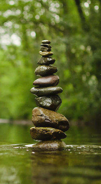 stack-of-river-stones-in-placid-water-colin-mcdonald.jpg