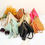 Миниатюра: Pyramid Shape Tassel Wristlet Leather Bag