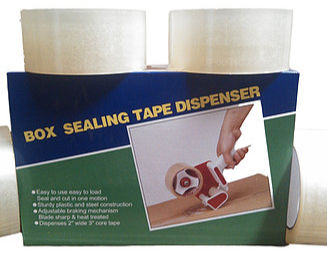 Close-up view of a packing tape gun loaded with tape