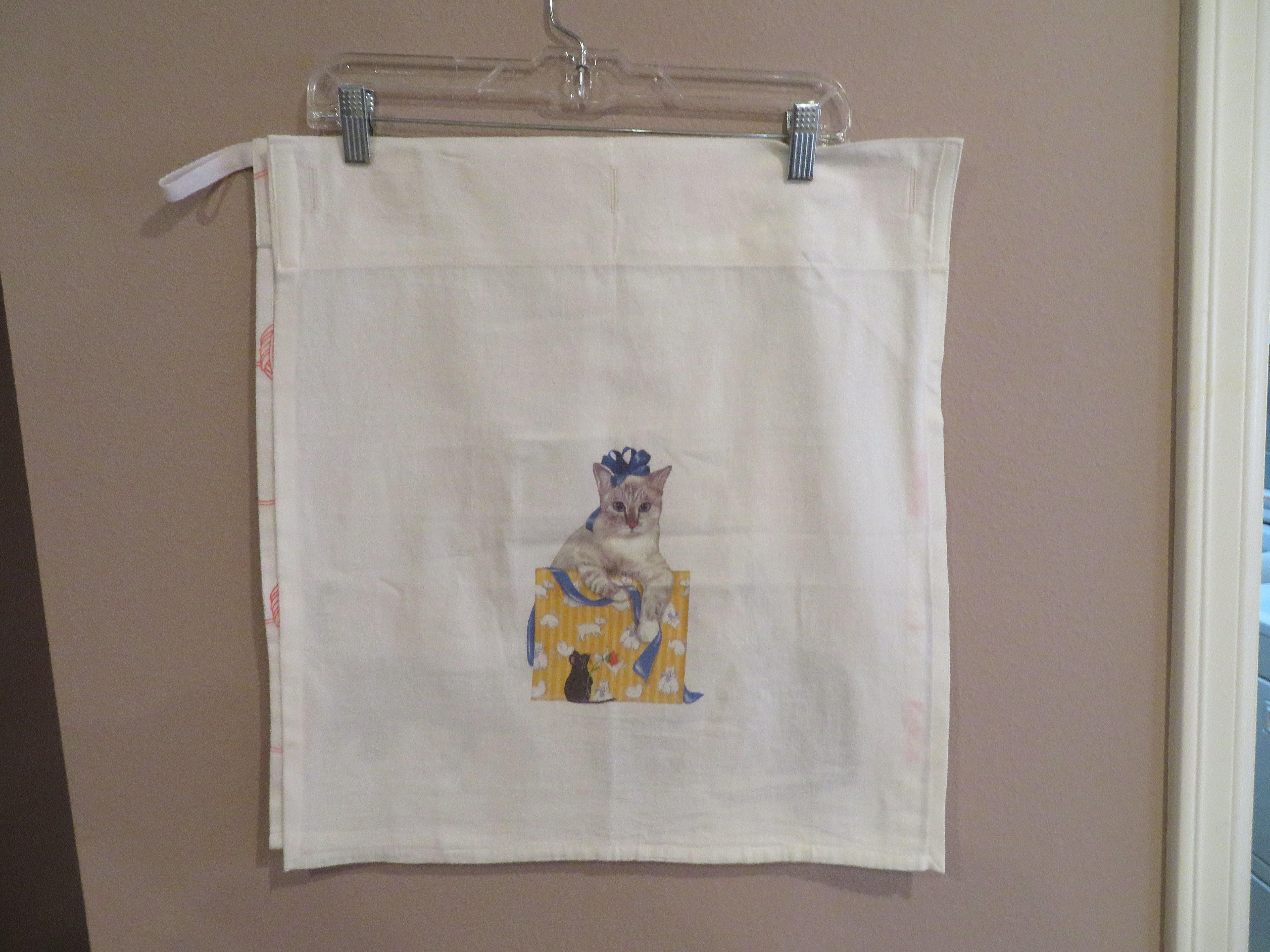 Kitten with blue ribbon and bow