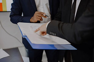 business signing Black man_edited.jpg