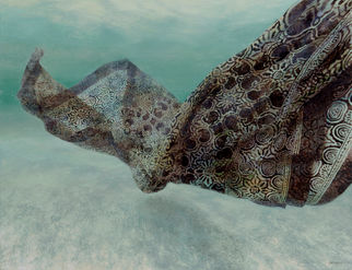 patterned fabric drifting underwater