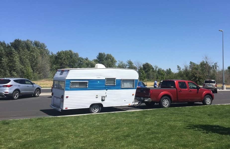 Pickup-Truck-Pulling-a-Small-Camper.jpg