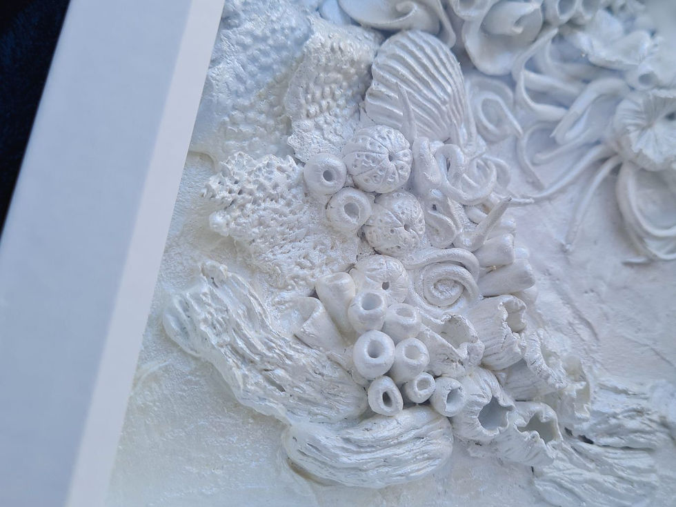 Thumbnail: framed clay coral reef artwork. White color scheme