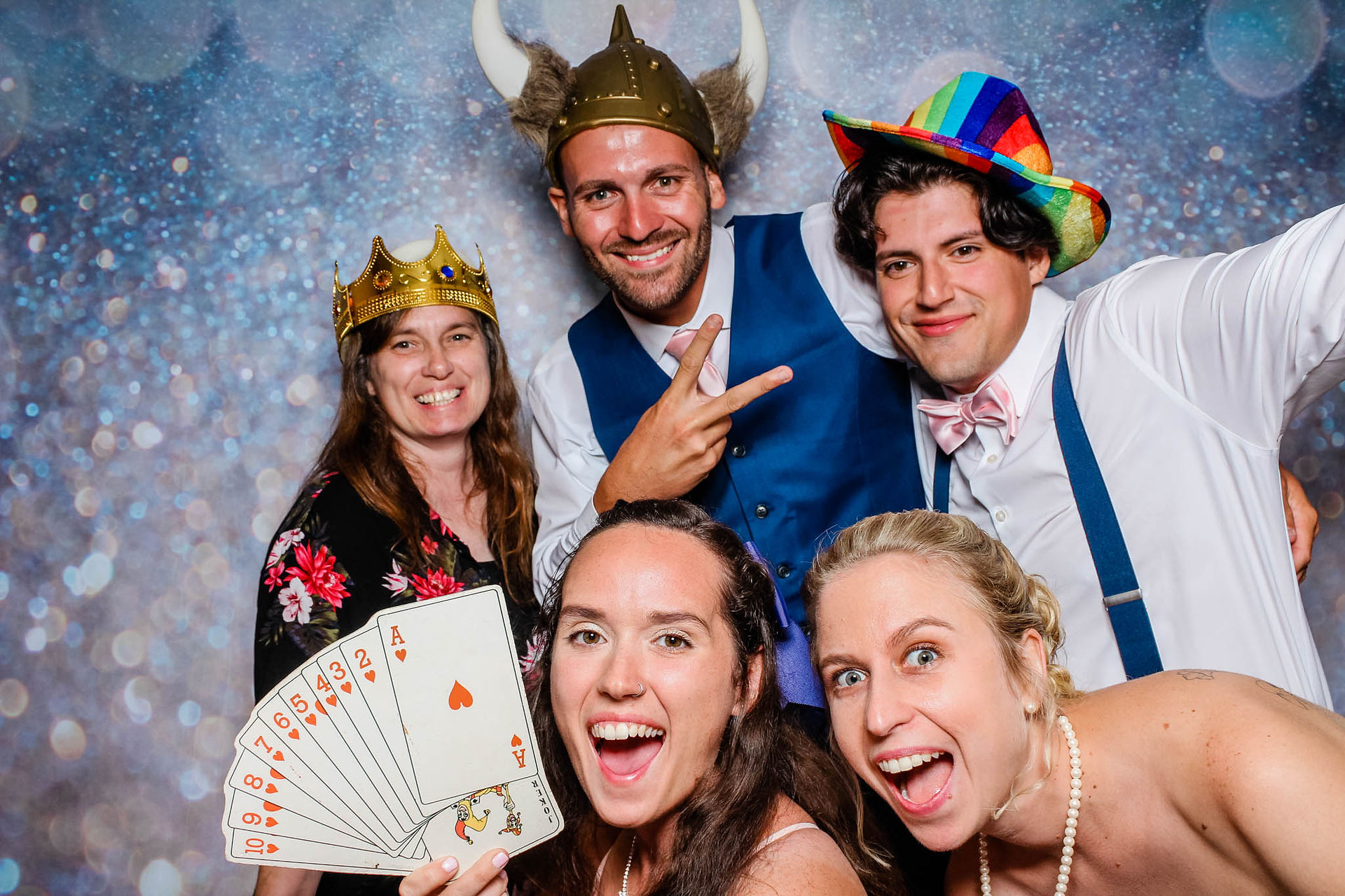 wedding guest having a great time in the photo booth