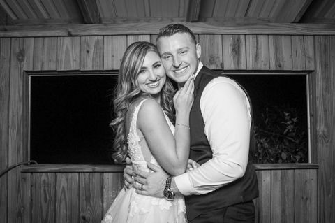 Happy wedding couple photo booth portrait