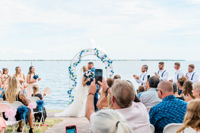 bride and grooms first kiss