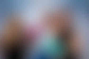 wedding guest having a great time in the photo booth