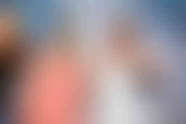 wedding guest having a great time in the photo booth