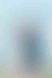 bride and grooms first kiss over looking the charlotte bay