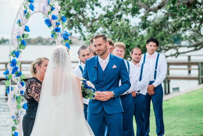 bride and groom share moment during ceremony