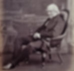The subject of our article, when he was Master of Trinity College, Cambridge in 1863; photograph taken by Ernest Edwards, courtesy wikimedia commons via the State Library of New South Wales.