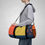 Thumbnail: Colorful floral duffel bag with bold polka dot details.