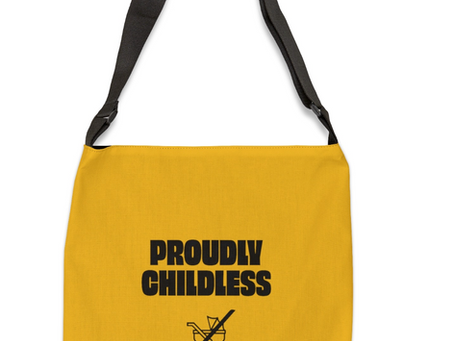 A yellow shoulder bag with a black adjustable strap, featuring bold black text that reads "PROUDLY CHILDLESS" above a crossed-out baby stroller icon.