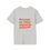 Thumbnail: Flat lay of gray t-shirt with bold attitude text in large print across the back
