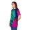 Thumbnail: Female model side view in Acid Dream Unisex T-shirt highlighting bold pink sleeve and acid print