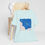 Thumbnail: Mint What Trails T-Shirt draped on chair displaying sky and cloud trail illustration