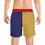 Thumbnail: Side angle of man wearing pixel parrot swim trunks in blue and yellow split-leg design with red waistband.