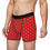 Thumbnail: Front angled view of a man wearing J.D. Vance Boxer Briefs with a red background and repeating cartoon face print.