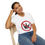 Thumbnail: Smiling woman wearing white No Monarchy T-shirt seated on chair