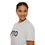 Thumbnail: A person smiling and wearing a light gray "PTO" T-shirt, angled slightly sideways.