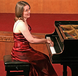 Amy at the piano cropped 2_edited.jpg