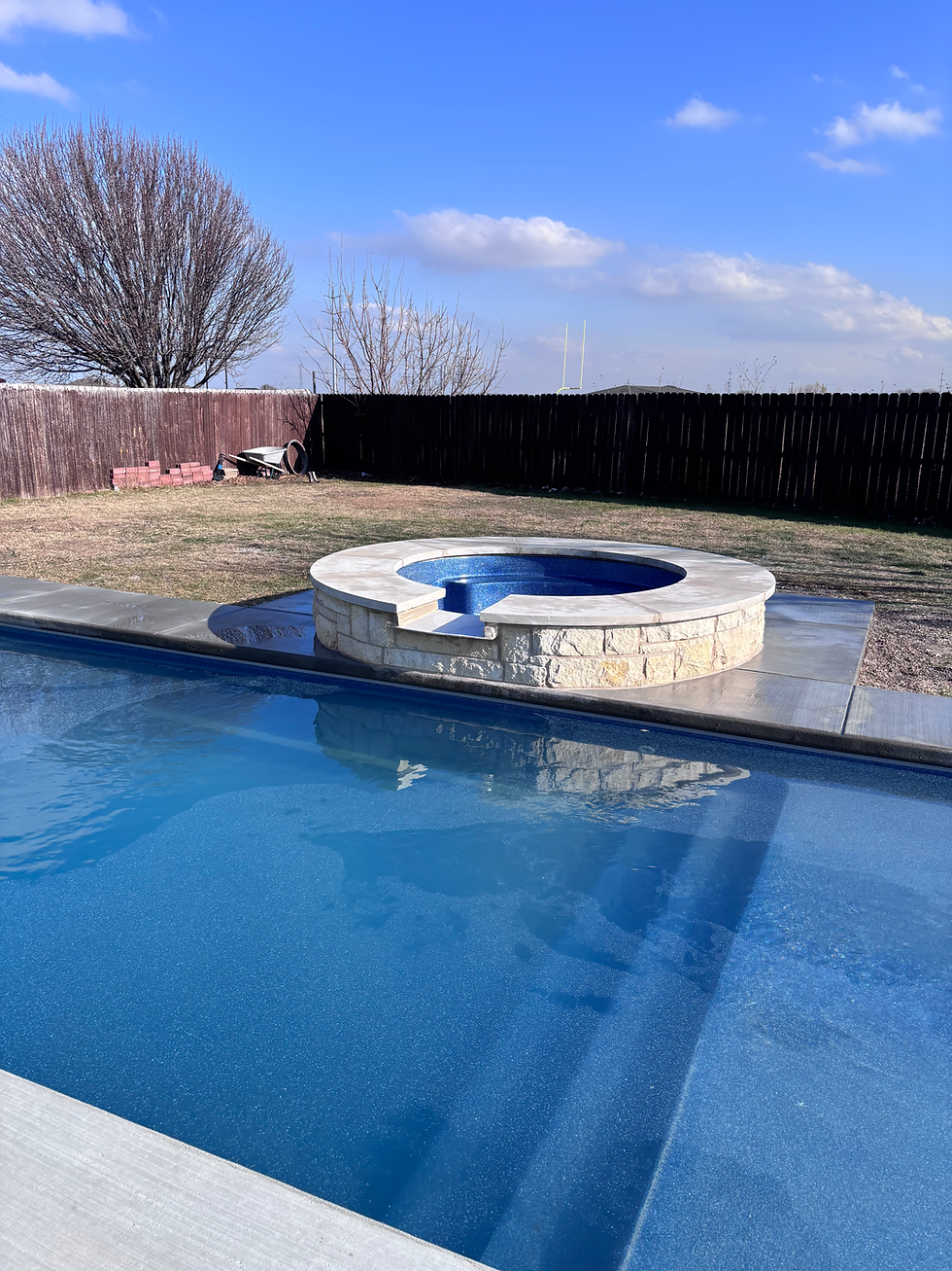 TEXAS BEST FIBERGLASS POOLS, SAN ANDRES MODEL WITH A RAISED SPA