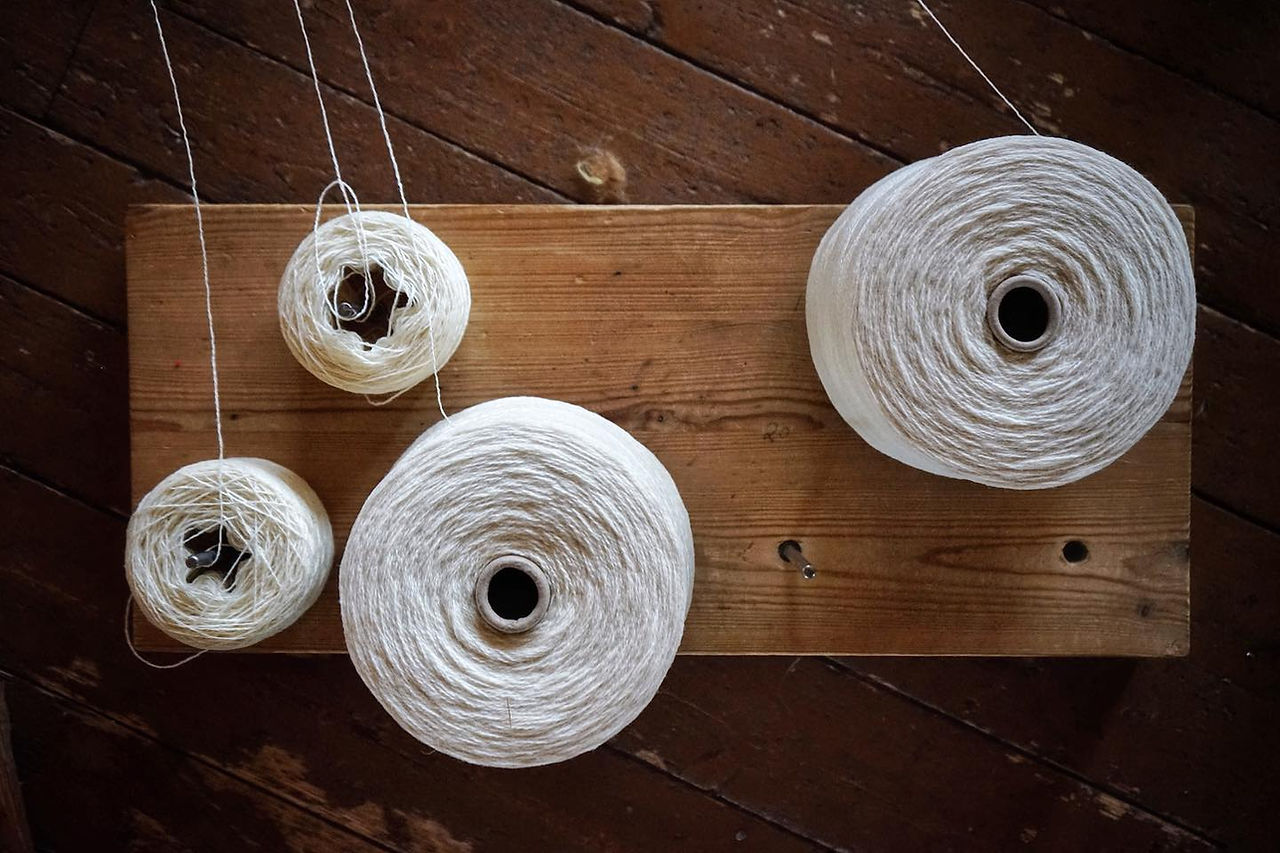 cones of white wool