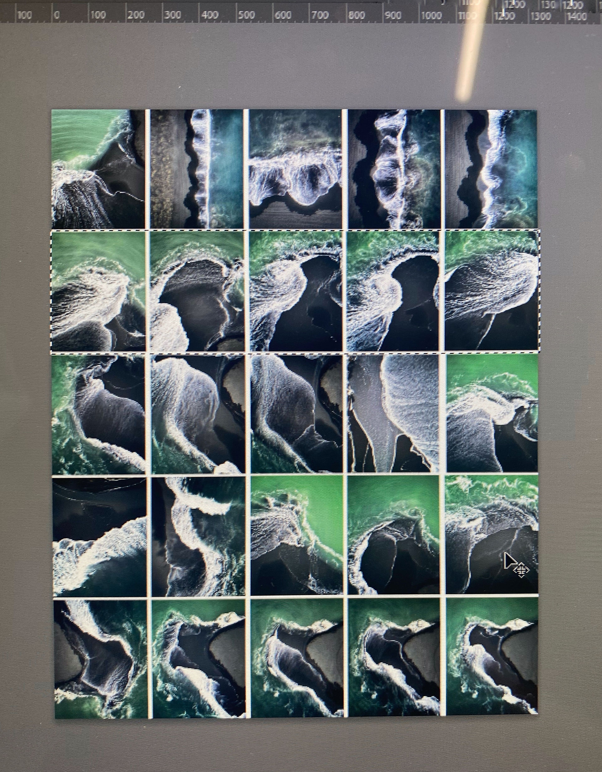 Small squares with green and black designs of coast from above