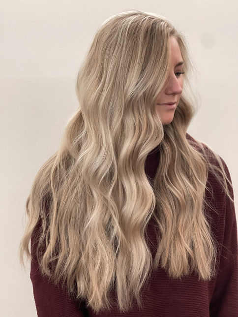 Woman with blond wavy hair
