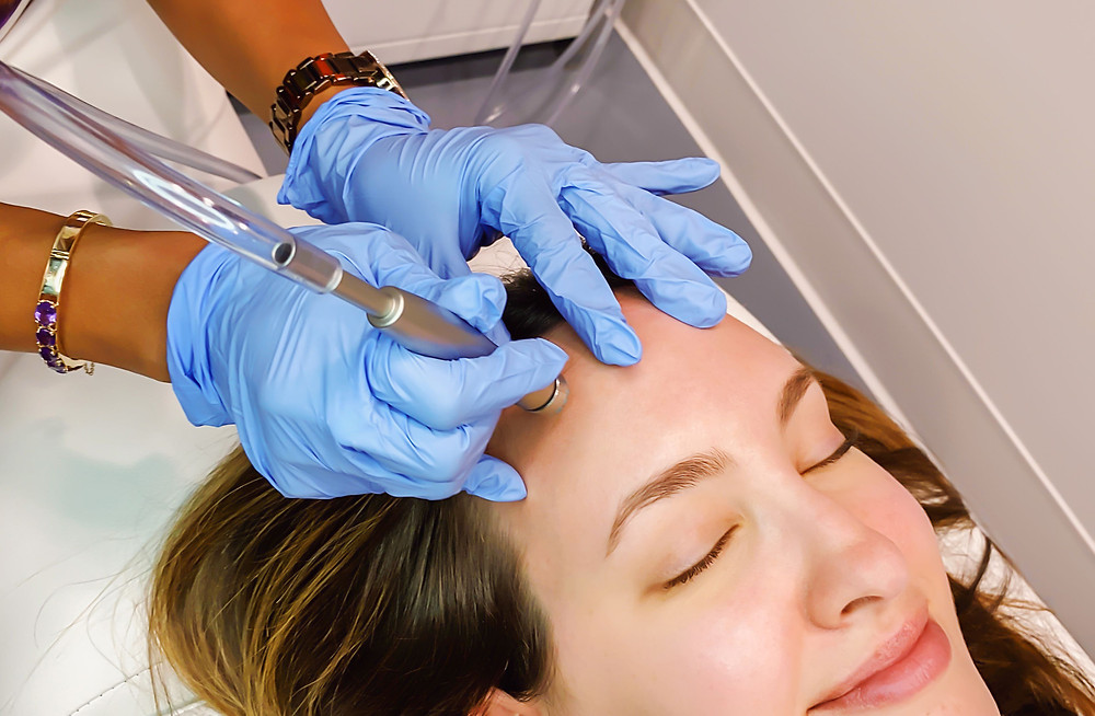 women receiving a med-tech facial