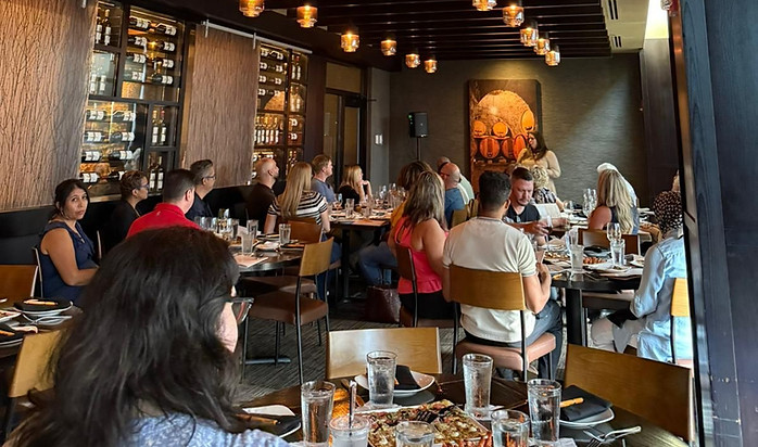 Guests attending a Tower Law Group Wine & Wills event in Orlando, Florida