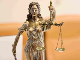 Lady Justice statue representing fairness in Social Security cases