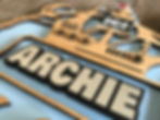 Thumbnail: close up of name in gold