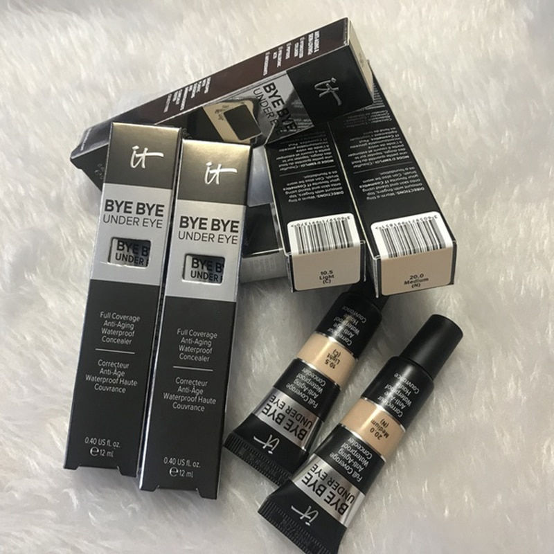 Miniaturebillede: IT Cosmetics Bye Bye Under Eye Concealer products over a white background.